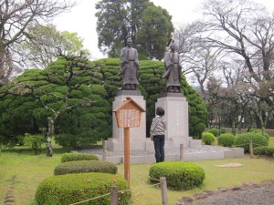 Monument to the two daimyos who built the garden. The woman bowed deeply to each one and stood there for a long time.
